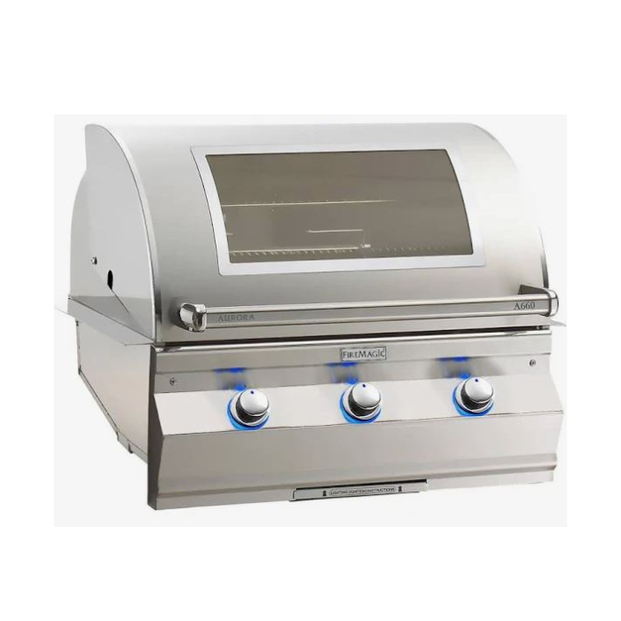Stainless steel grill with three control knobs on a white background