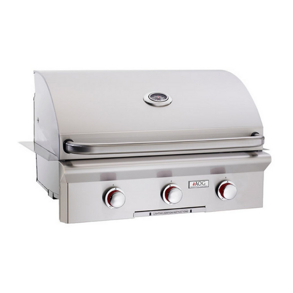 Stainless steel grill with three control knobs on a white background