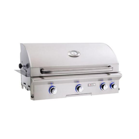 Stainless steel grill with four burners on a white background